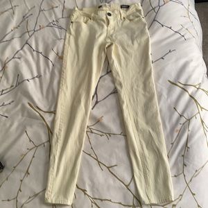 Pale yellow stretch skinny jeans